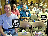 Residents of Dendron, Virginia, opposing a new coal-fired power plant proposed for their town